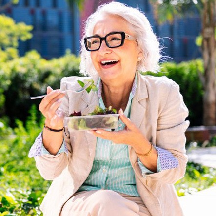 Lady eats salad