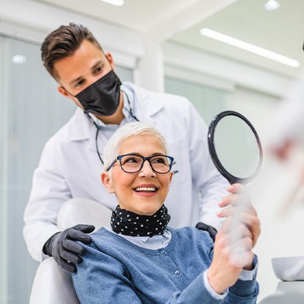 Lady looks at self in mirror