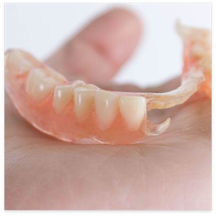 Partial dentures with gum colored base