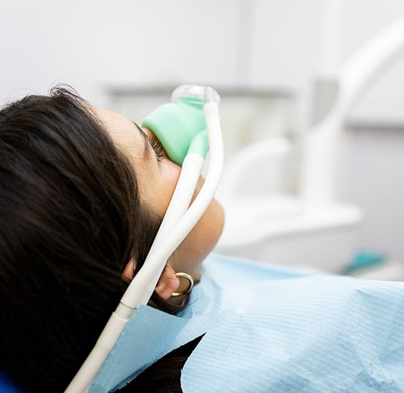 Patient breathing in nitrous oxide