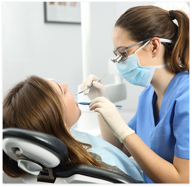 Female dental patient having teeth cleaned by dentist for preventive dentistry in Cottonwood Heights